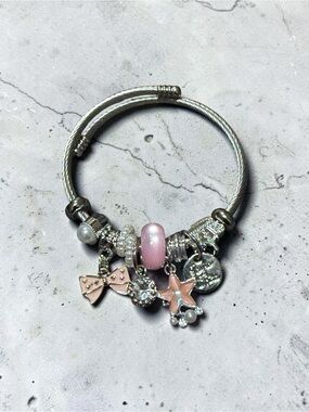Silver Tone Adjustable Pink Charm Bangle Bracelet with Star and Bow Charms